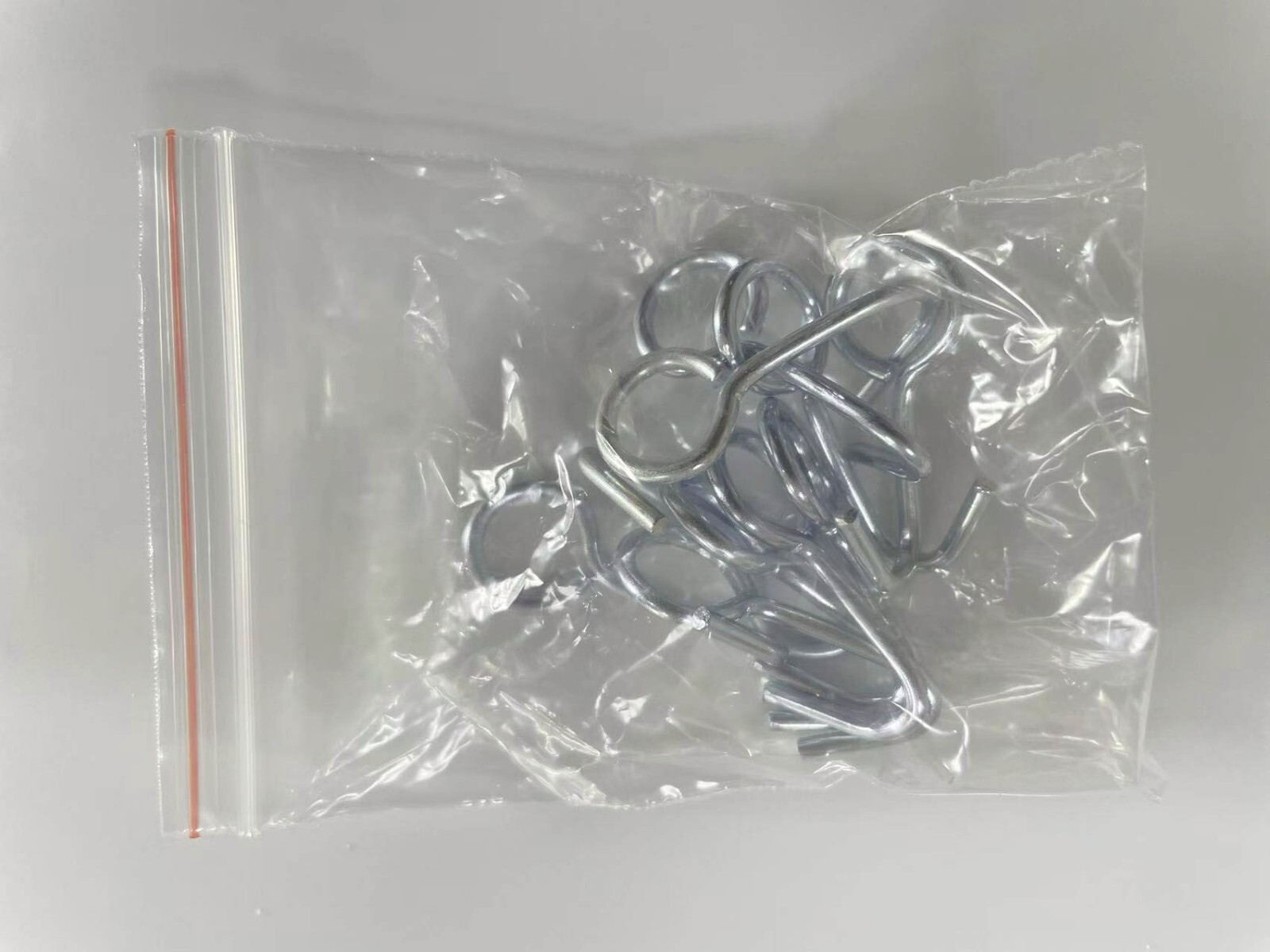 Instalation hardware for seat covers , metal chromed hooks and plastic octogons