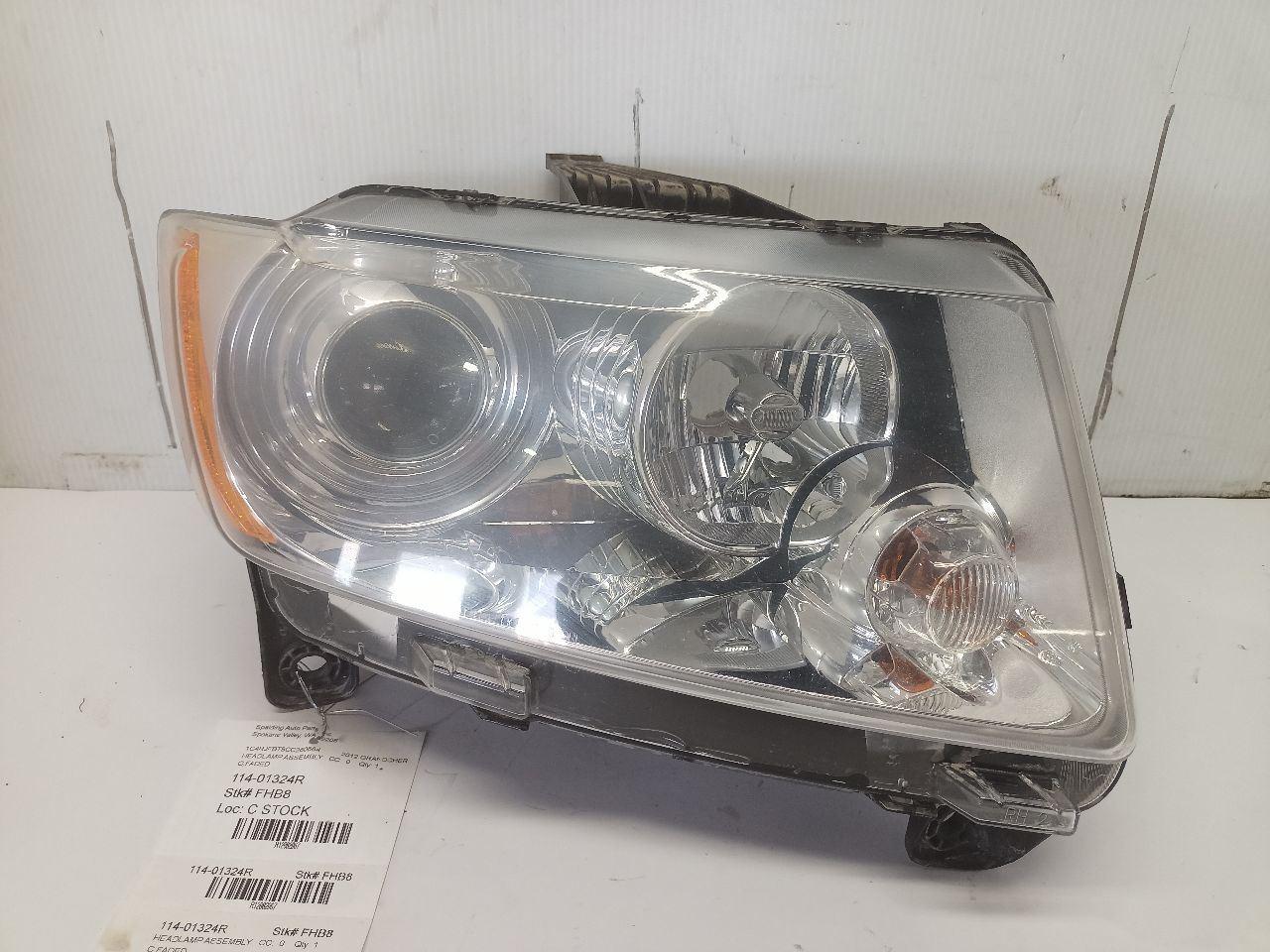 Passenger Right Headlight from 2012 Jeep Grand Cherokee 12882967
