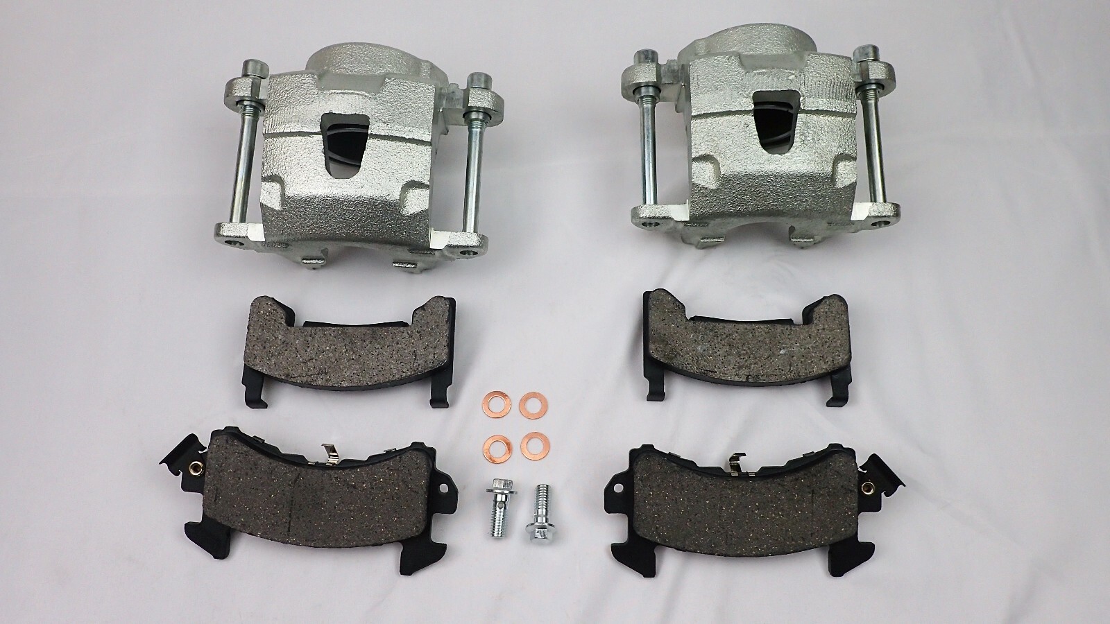 GM metric front disc brake calipers with pads and hoses