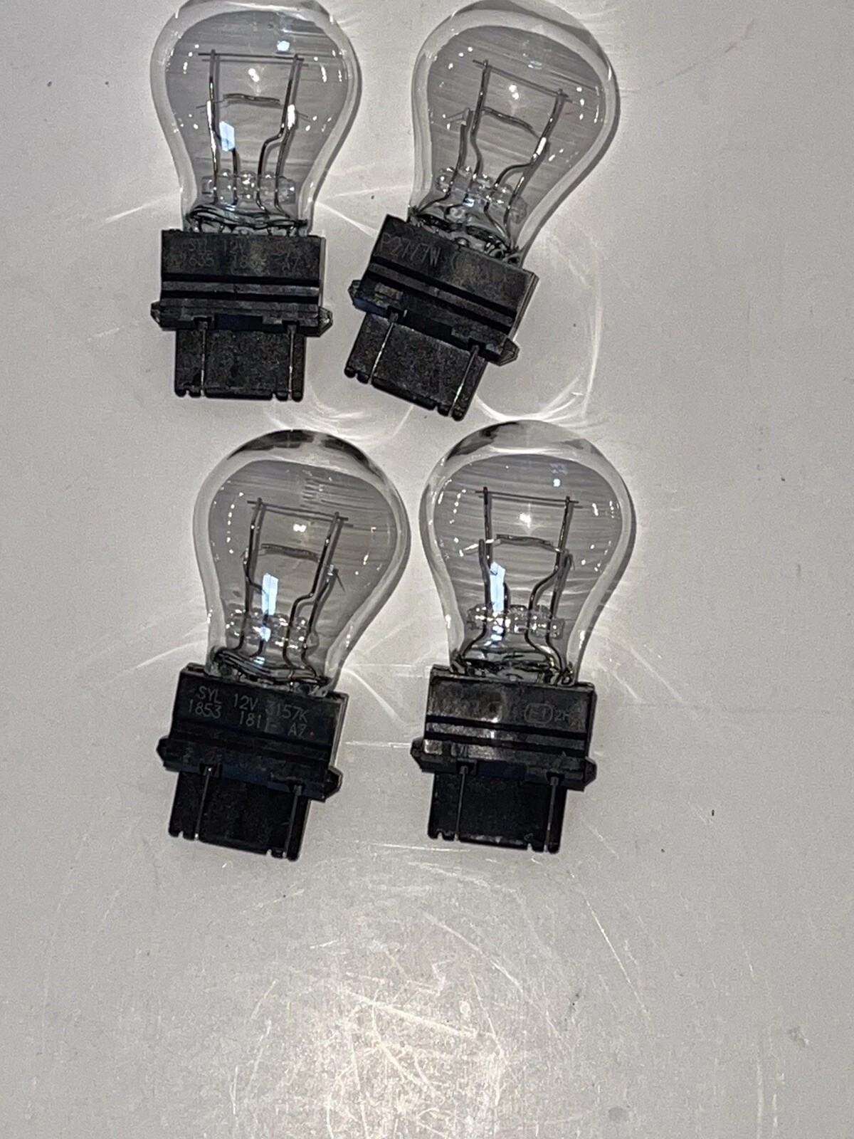 4 Sylvania OEM 3157 Dual Filament Tail Turn Signal Stop Replacement Bulbs
