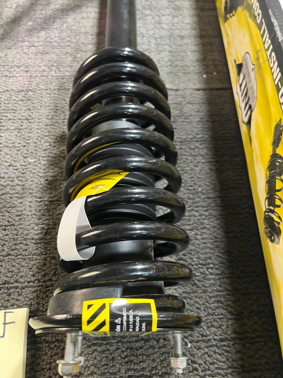 Unity Automotive 11213 Suspension Strut and Coil Spring Assembly Front Left