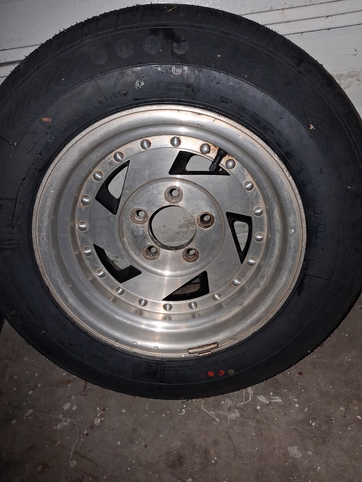 A pair of used wheels with BRAND NEW tires. 195 70r14 with a 5.5 lug pattern