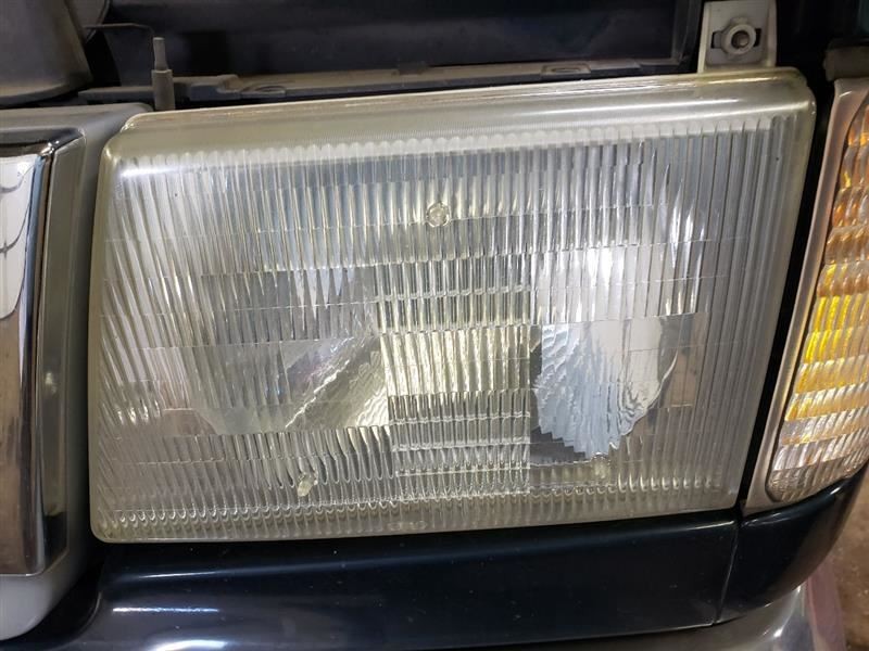 Driver Left Headlight Composite Fits 97-07 FORD E150 VAN 941556