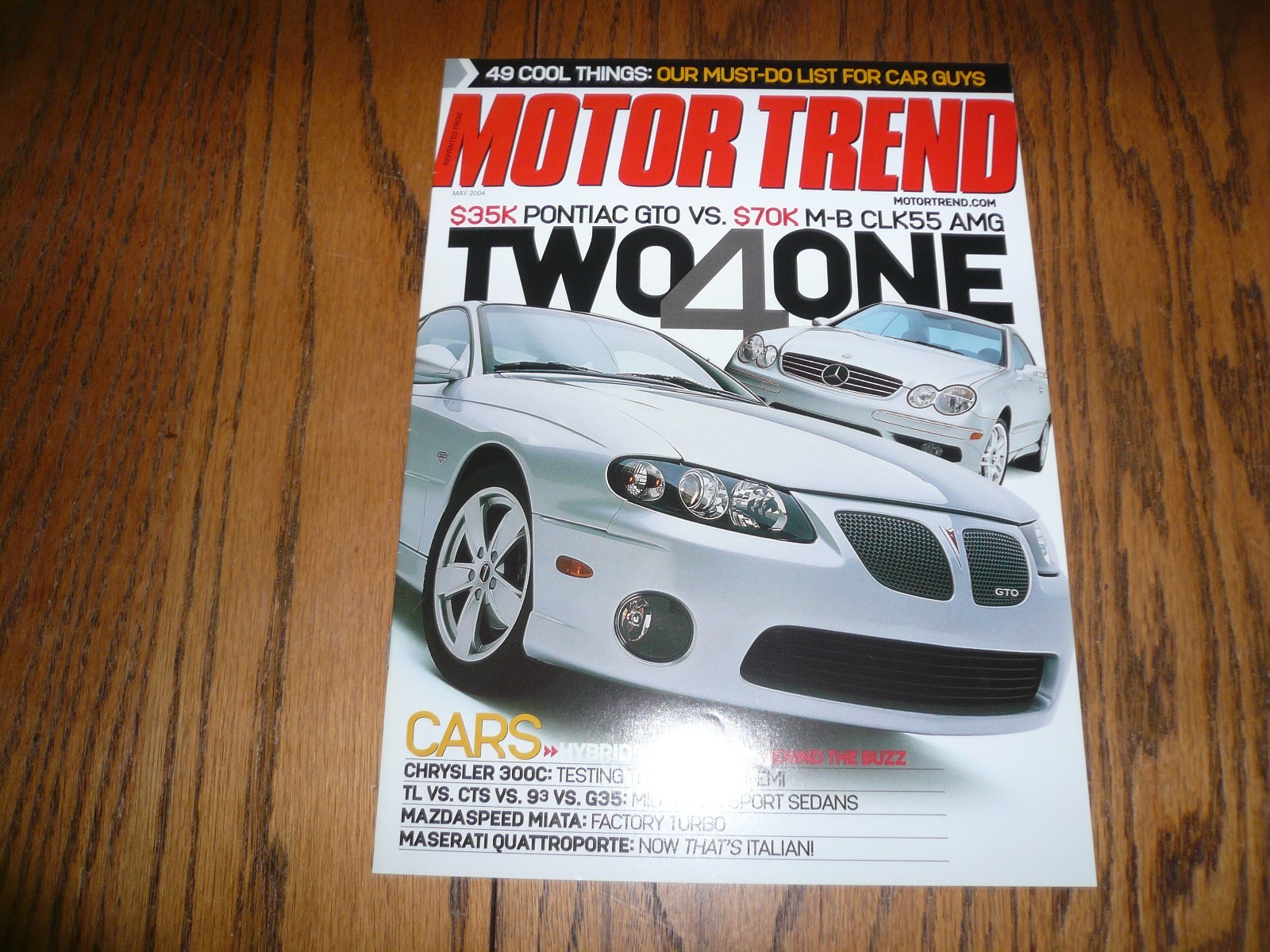 2004 May Motor Trend Article Reprint Pontiac GTO vs. Mercedes Benz CLK55 AMG