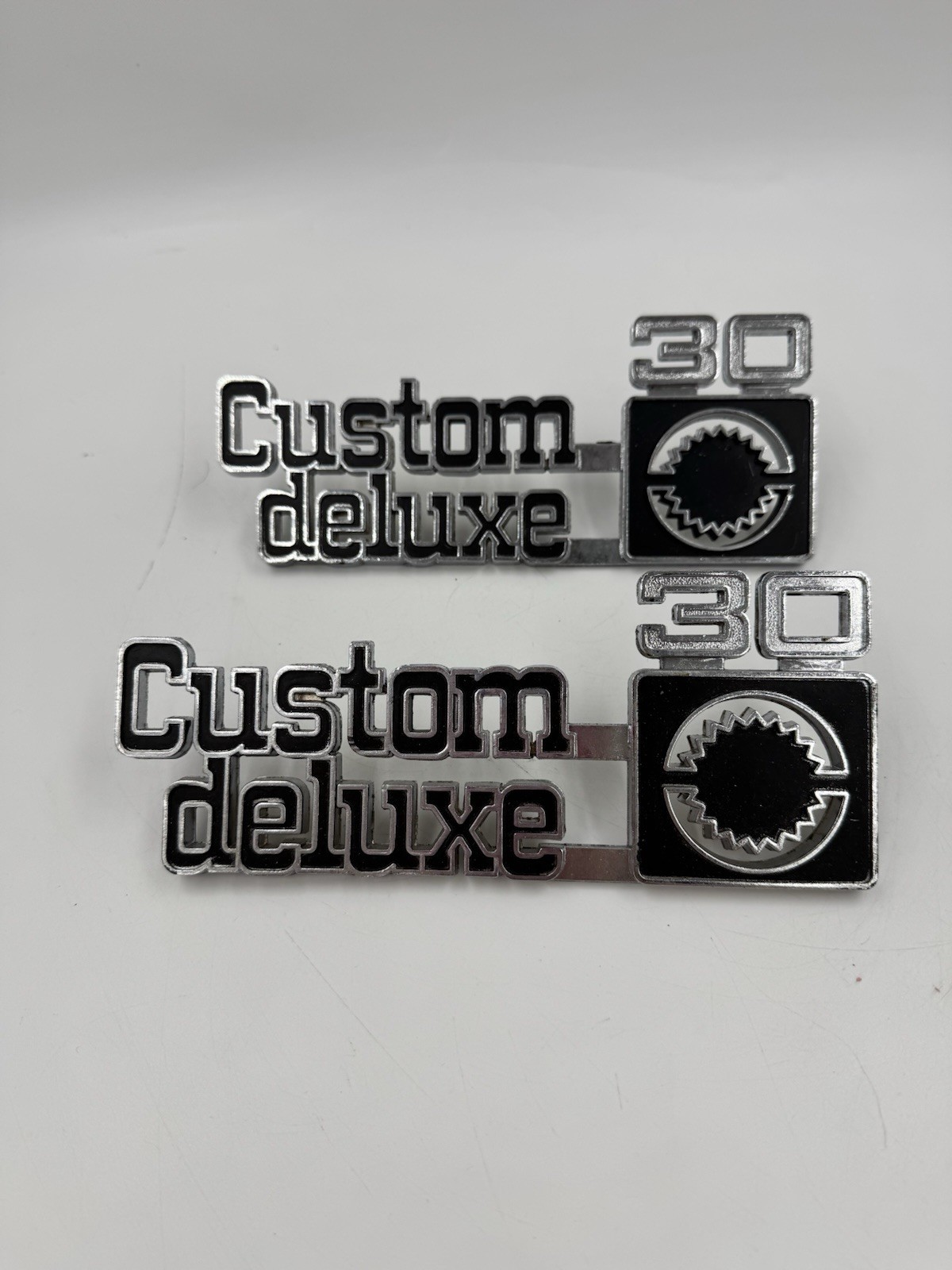NOS 1975-1980 Chevrolet Custom Deluxe 30 Front Fender Emblem Set No Package