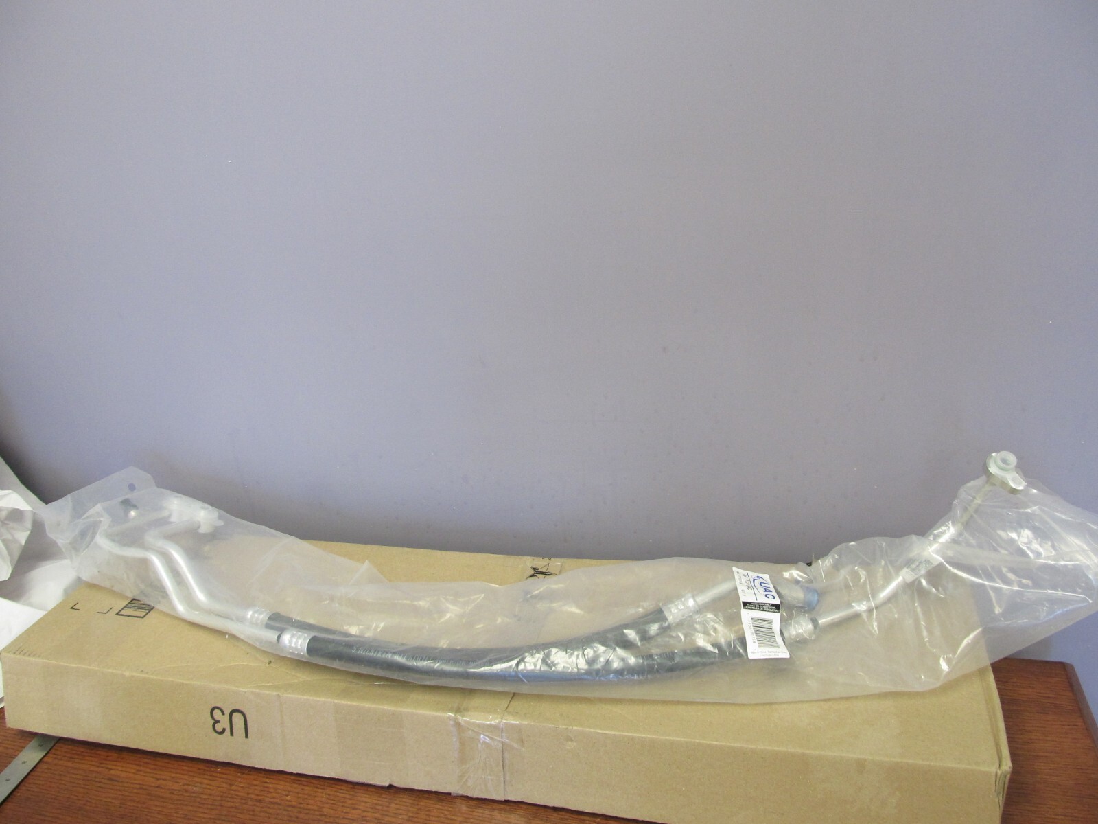 NEW – UAC 10104C Suction and Discharge Assembly for Dodge Ram 55055830AC