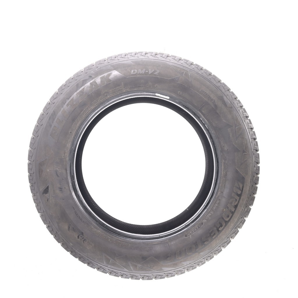 Set of (4) Used 235/65R17 Bridgestone Blizzak DM-V2 108S – 8-8.5/32