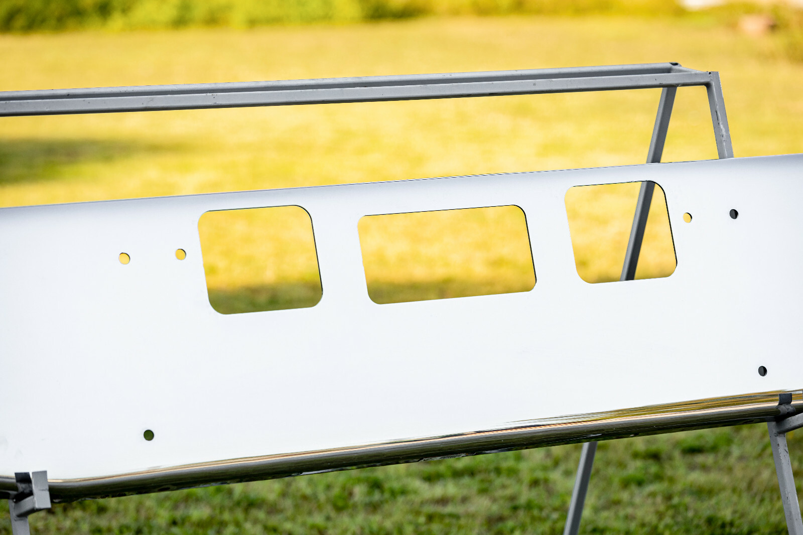 Freightliner Coronado / 122SD Bumper – Chrome 16″ Tapered with Tow, Step Cutouts