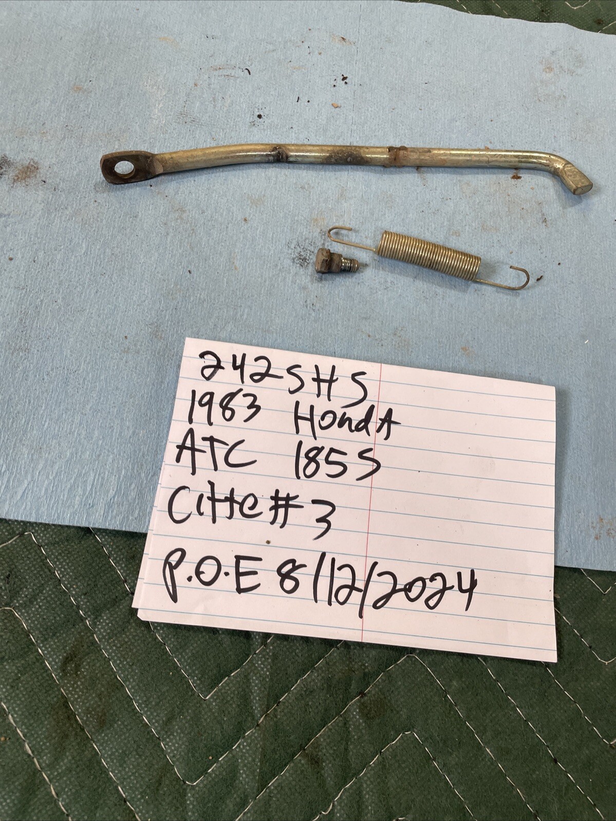 1983 Honda ATC 185 S seat latch release lever 242
