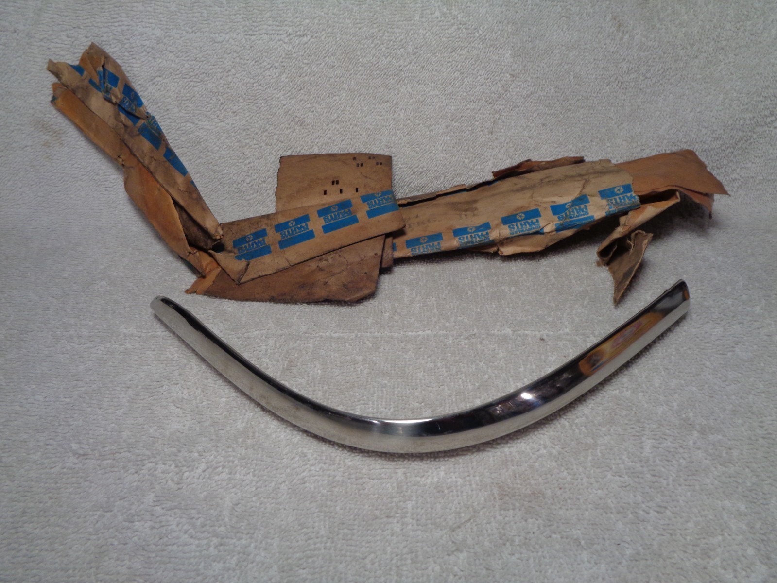 NOS Mopar 1963-65 Plymouth Rear Quarter Corner Molding