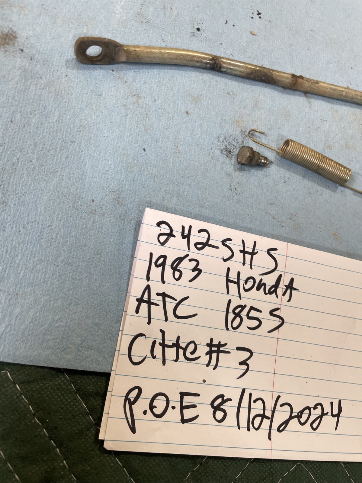 1983 Honda ATC 185 S seat latch release lever 242