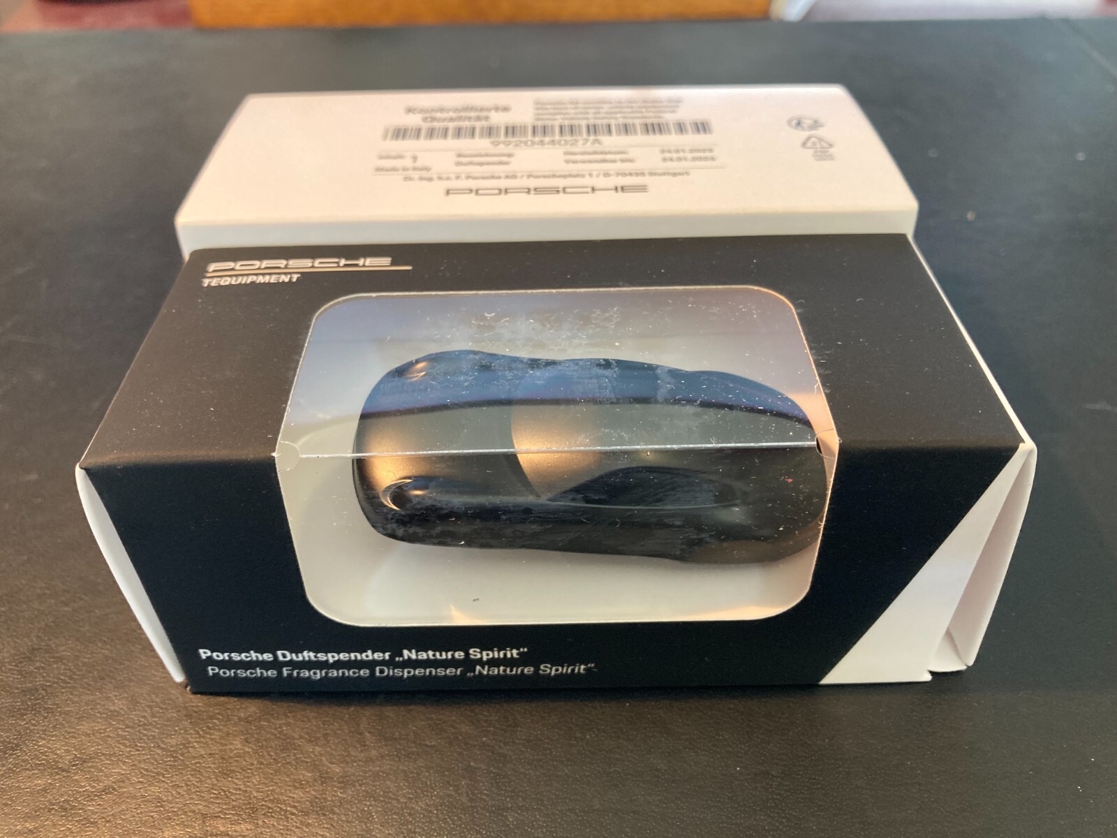 PORSCHE DESIGN OEM 911 CLIP ON VENT AIR FRESHENER W/NATURE SPIRIT IN BLACK.