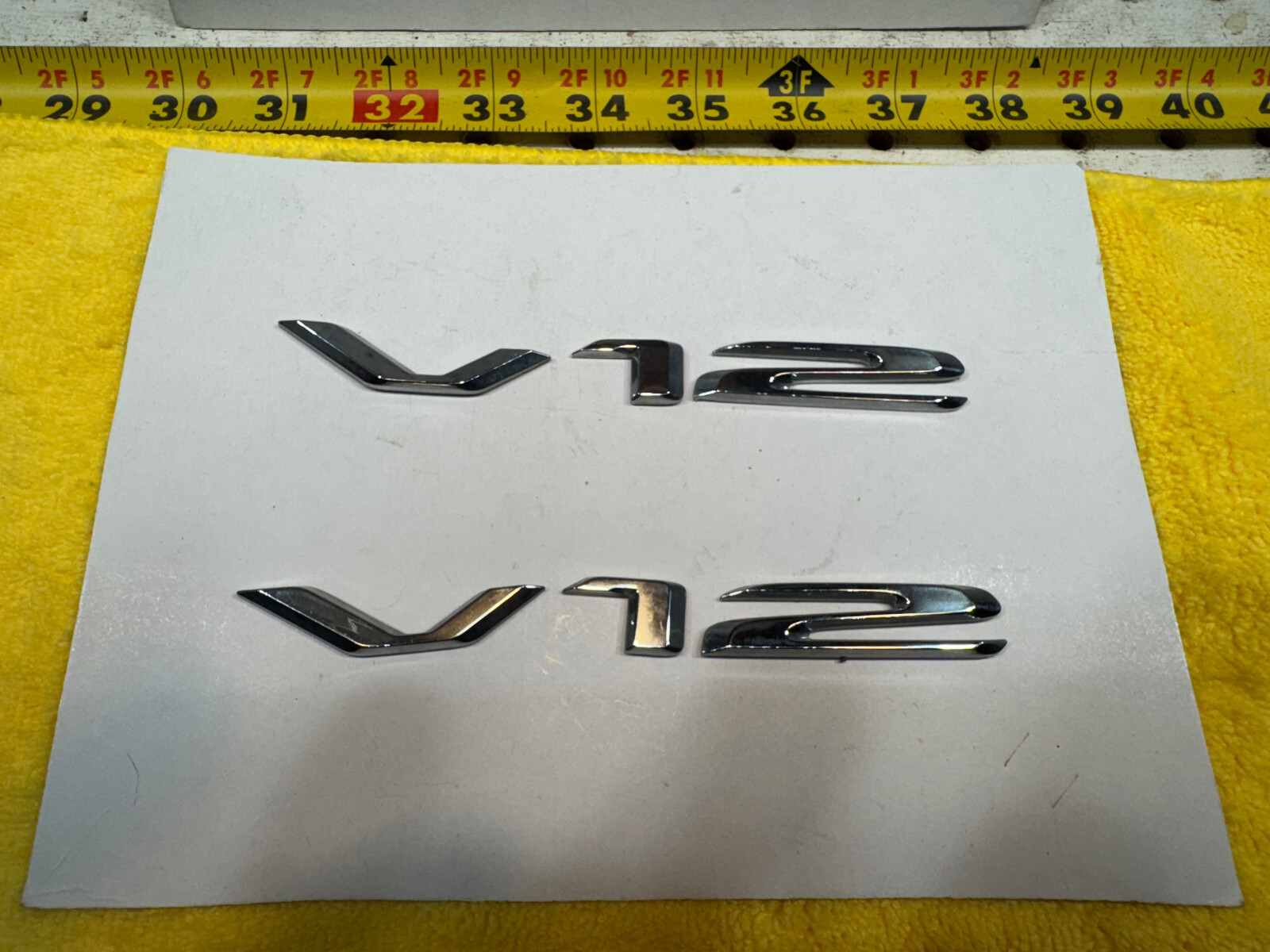 Genuine Mercedes 93-95 R129 SL600 V12 fender sides PLASTIC chrome V12 Two Emblem