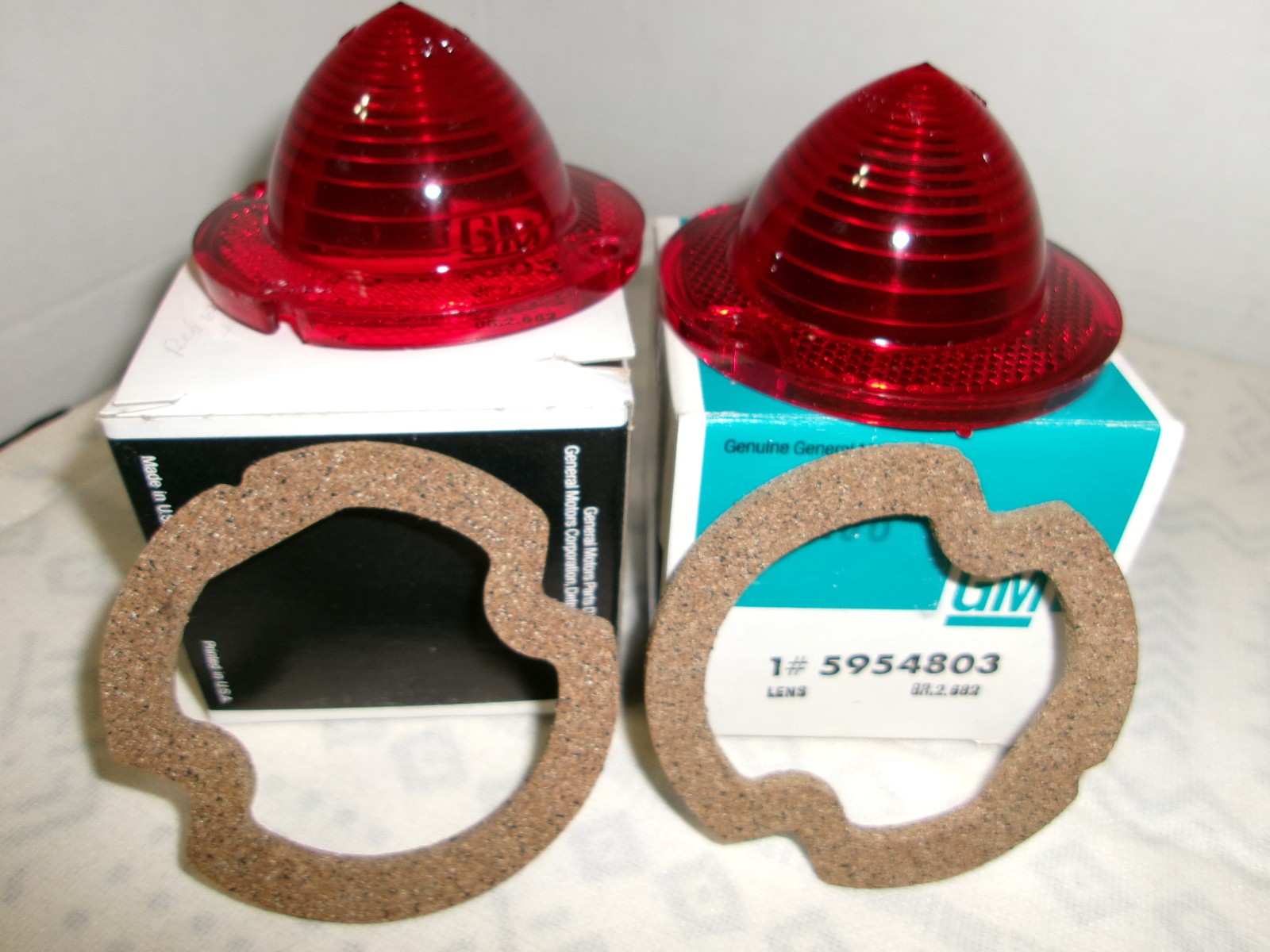 C-1 -2 CORVETTE 1961-1967 TAIL LIGHT LENS PAIR INCLUDES GASKETS NOS G.M. GUIDE