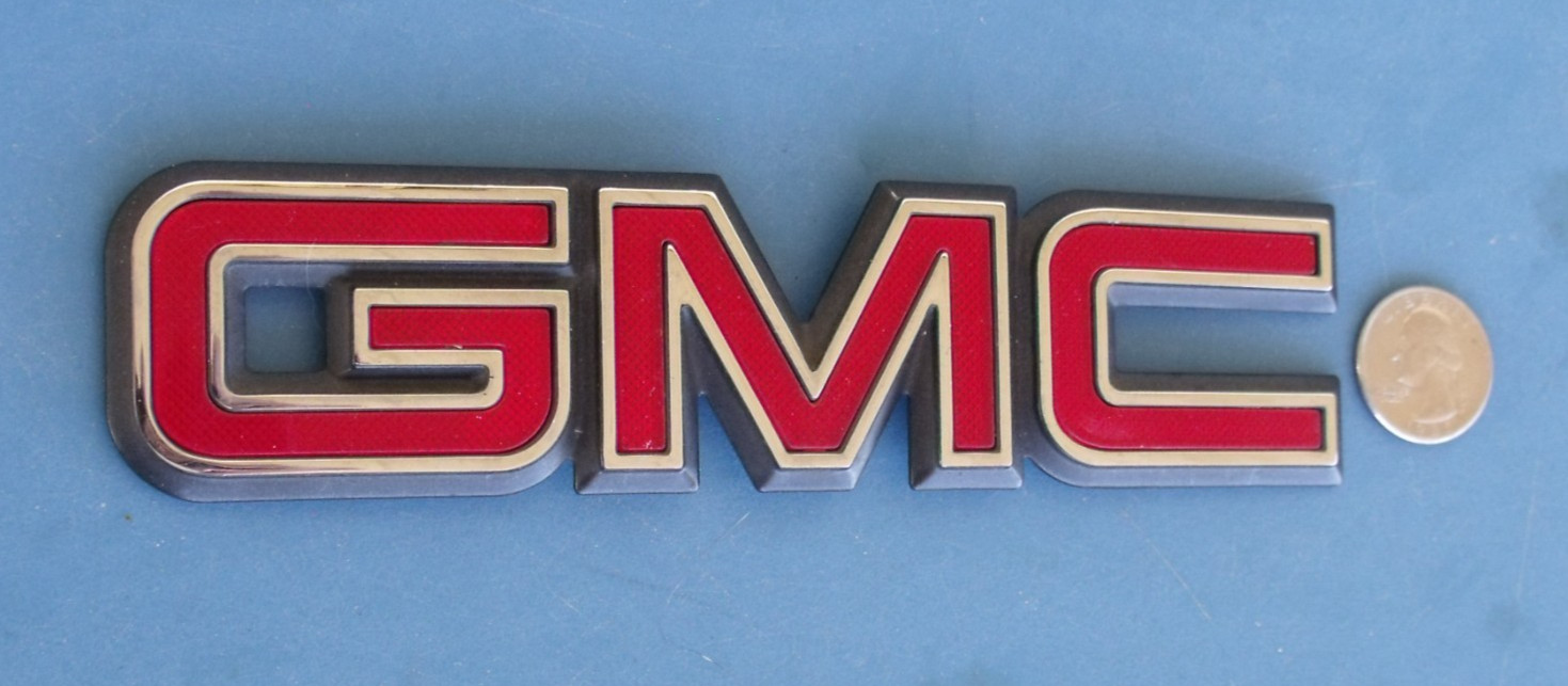 GMC EMBLEM RED/BLK/CHROME OEM REAR YUKON SIERRA 7″WIDE X 1 5/8″HIGH 15029627