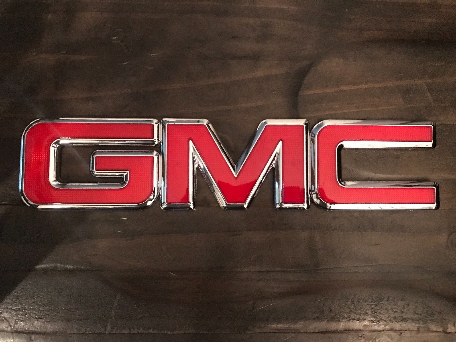 GMC OEM Front Grille Emblems Red & Black Chrome Sierra Yukon Savanna 22881265