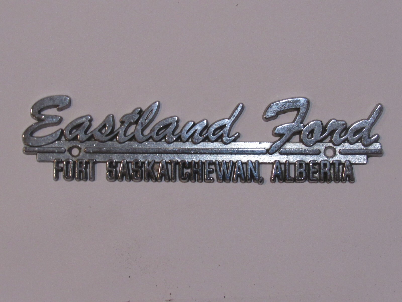 Vintage Eastland Ford Fort Saskatchewan Alberta Canada Metal Dealer Badge Emblem