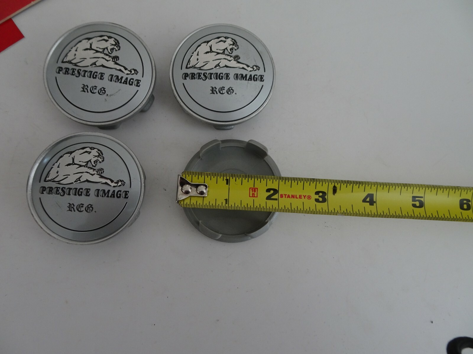 PRESTIGE IMAGE Silver Custom Center Cap # N/A, 2″ Inches On Backside.